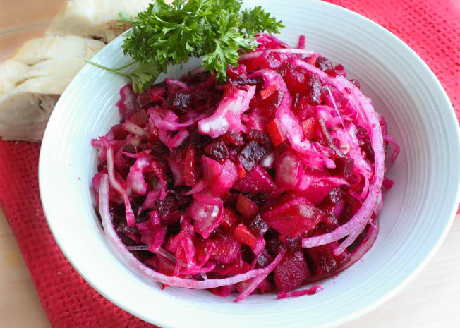 Russian Salad Vinegrette with beats, potatoes, carrots, Sauerkraut, and pickles.