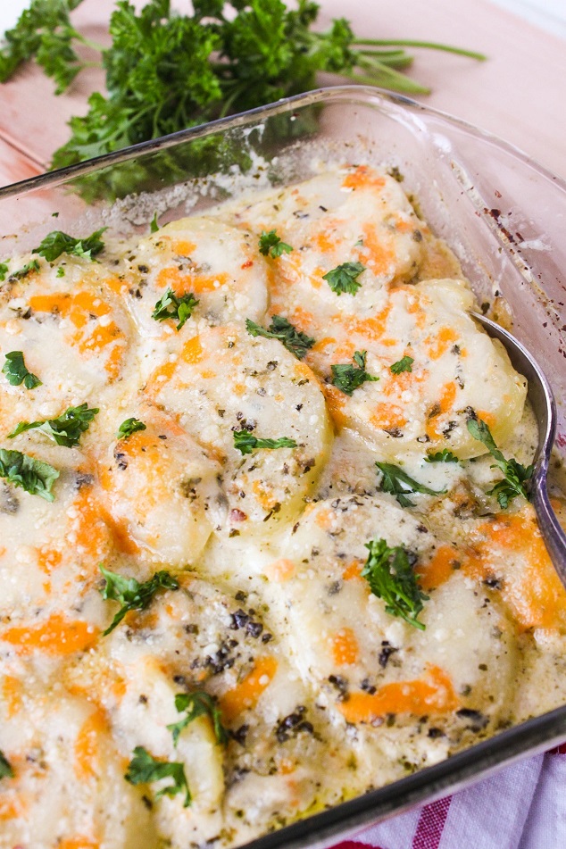 Delicious Creamy Baked Potatoes with Pesto and Cheese